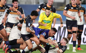 Caleb Clarke of the Blues dives down to score a try during the Super Rugby Pacific match against the Brumbies at Eden Park, 2024.