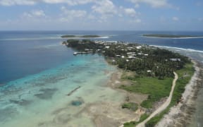 Most islands in atoll nations, such as in this aerial view of Jaluit in the Marshall Islands, are as little as two meters above sea level and threatened by climate change.