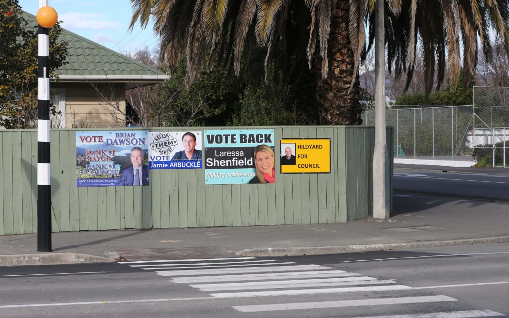 Candidate signs from the 2016 local election, not supposed to be near an intersection.