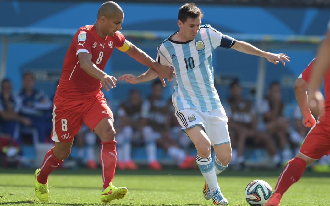 Argentina's Lionel Messi playing against Switzerland at 2014 football World Cup in Brazil.