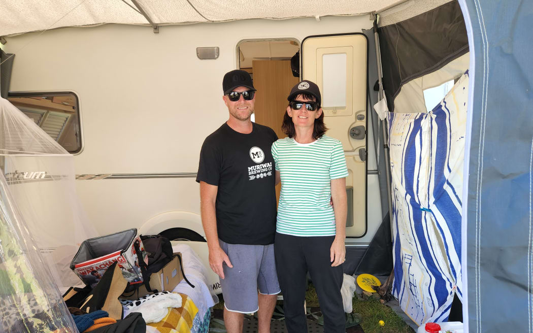 Motutara Road residents Jay Brown and his partner Michaela say there's no certainty over how long they'll be in temporary accommodation for.