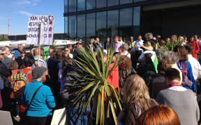 Protesters outside the Southern Response office in Christchurch.