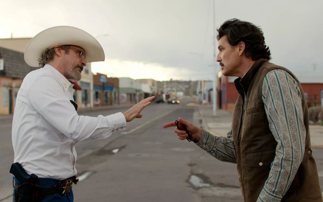Joaquin Phoenix and Pedro Pascal in Eddington.