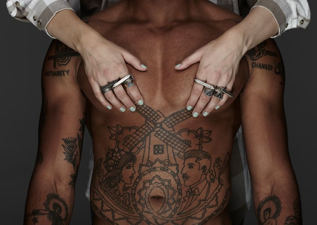 I Love Ugly attempted to appease critics by releasing a new series of images featuring a clothed woman on a naked man’s chest.