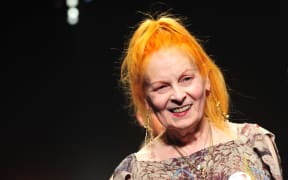 Dame Vivienne acknowledging the audience at the end of a fashion show in Milan in 2011.