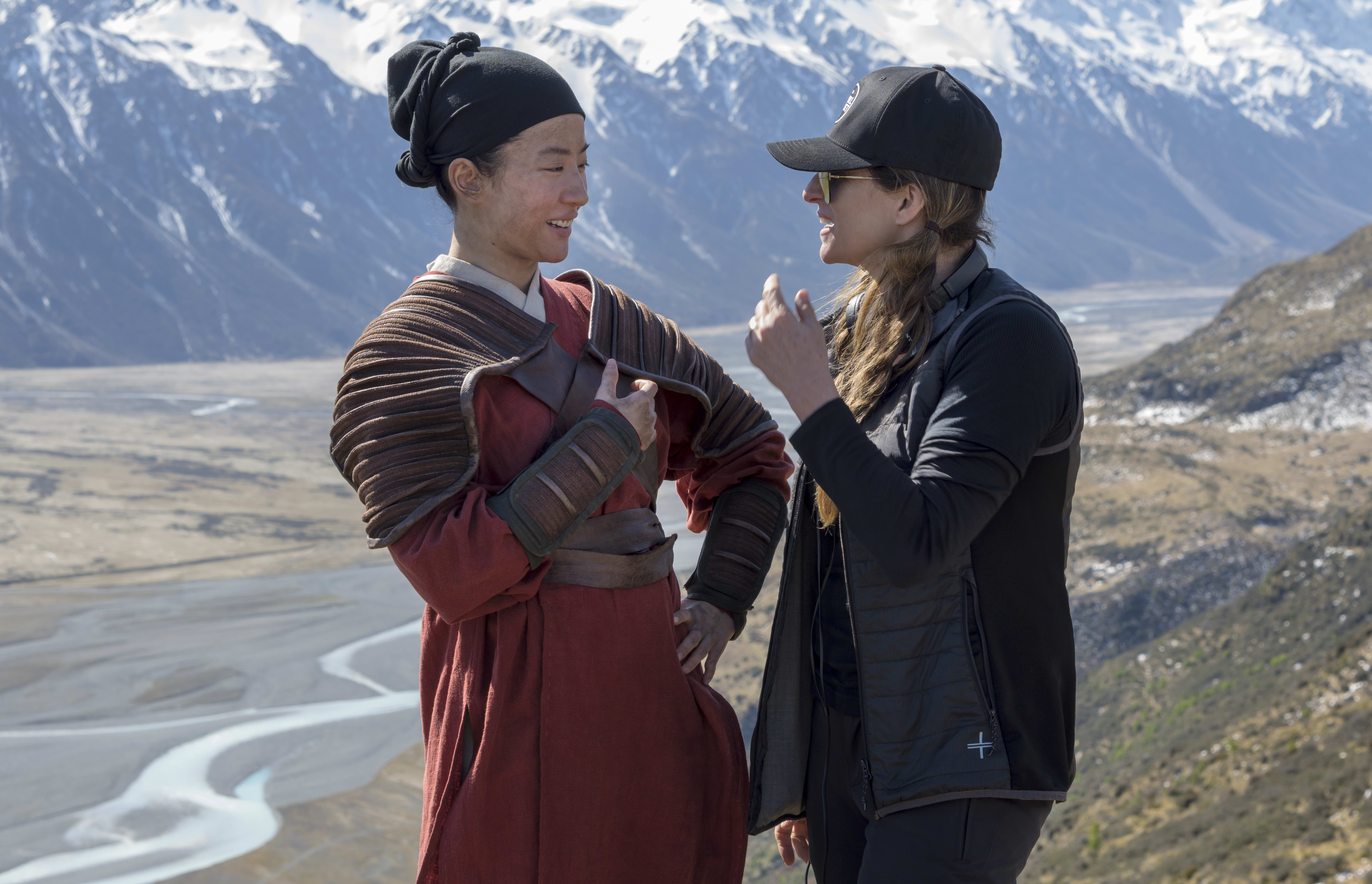 Niki Caro (right) on the set of Mulan