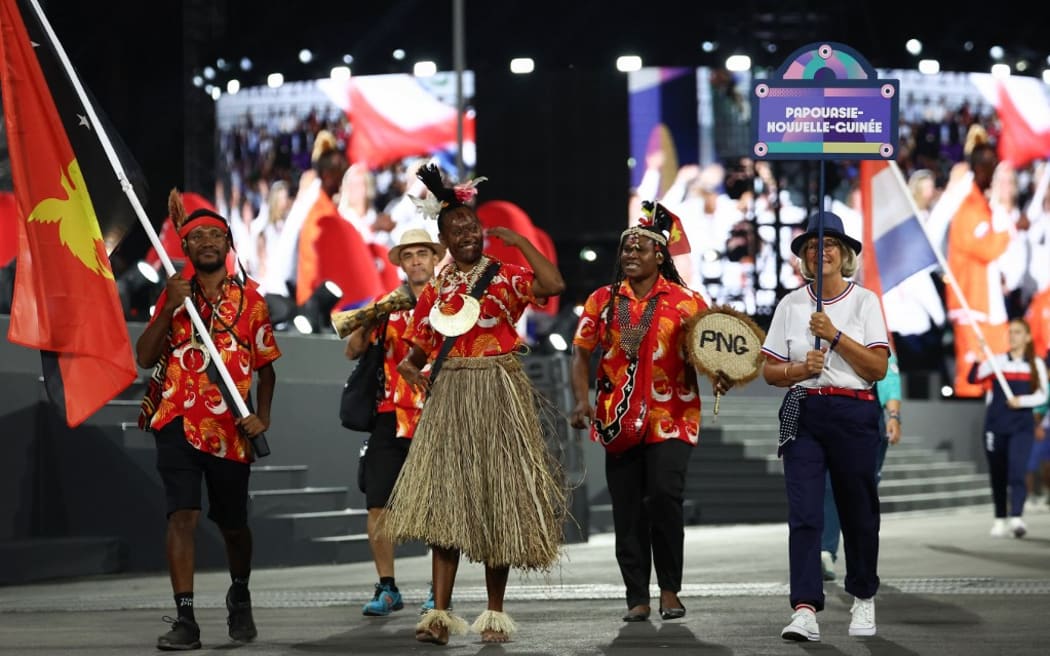 Papua New Guinea's delegation parades at the Place de la Concorde during the Paris 2024 Paralympic Games Opening Ceremony in Paris on August 28, 2024. (Photo by Franck FIFE / AFP)