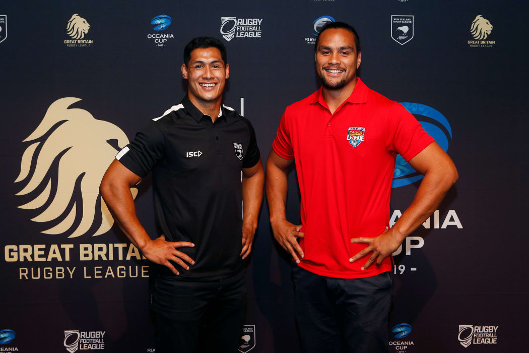 NZ's Roger Tuivasa-Sheck (left) and Tonga's Leivaha Pulu pose before Saturday's triple-header