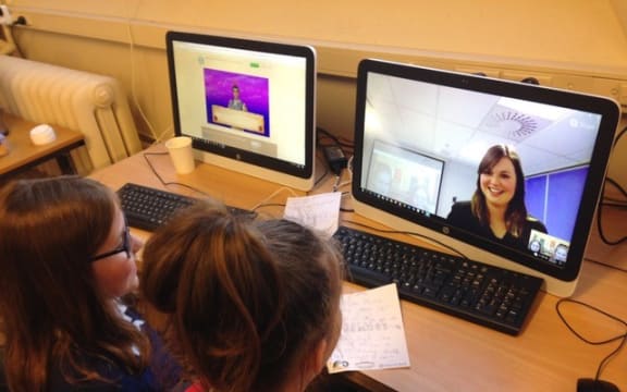 Students Neva Bertram and Iris Gallagher interviewing Kelsey Brown from the Office of the Children’s Commissioner to research their app, G.I.R.L.S.