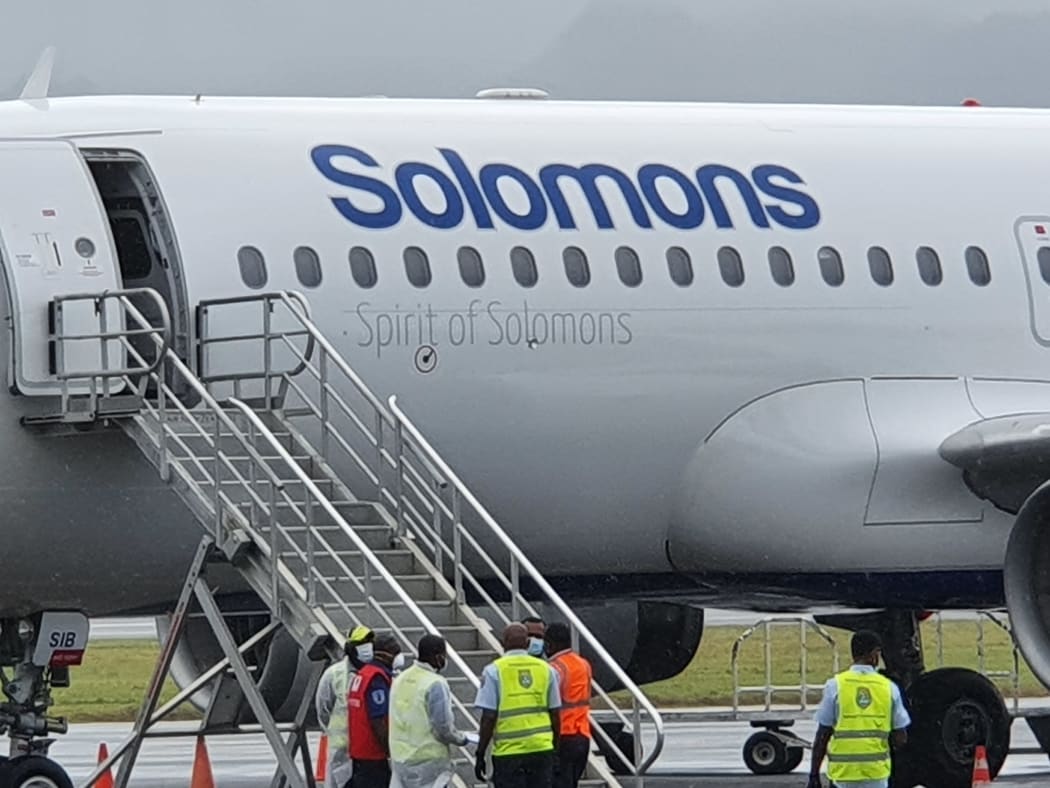 The seven ni-Vanuatu returned to Port Vila via this Solomon Airlines plane