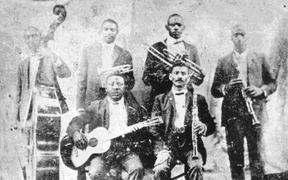 Jazz musician Buddy Bolden is the subject of Michael Ondaatje's book "Coming Through Slauther"