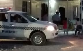 Nauruan police attend a protest by children at the offshore processing centre.