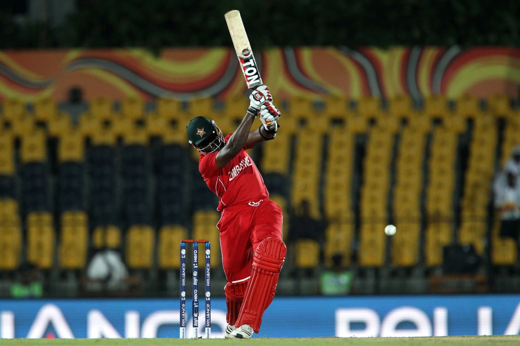 Hamilton Masakadza drives a delivery from Morne Morkel during the ICC World Twenty20 Pool C match between South Africa and Zimbabwe in Hambantota, Sri Lanka on the 20th September 2012