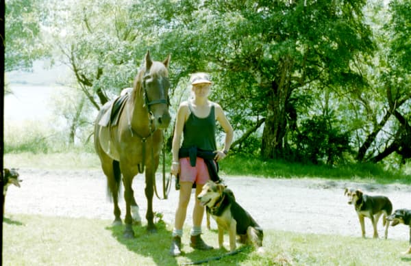 Neroli Prouting and dogs at Arrowsmith Station, 1993.