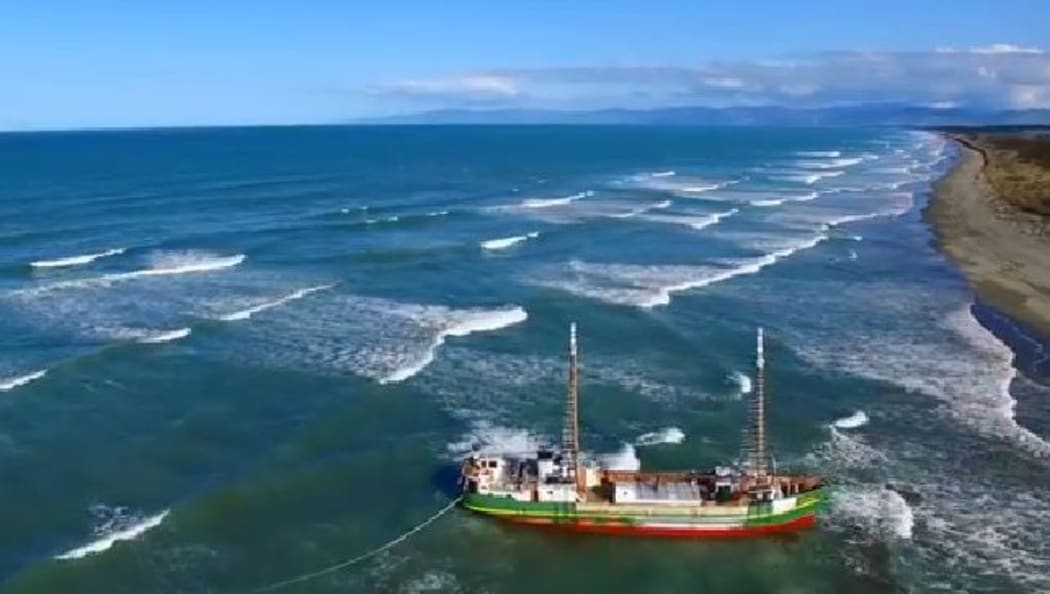 The recently-restored Tuhoe grounded at the mouth of the Waimakariri River.
