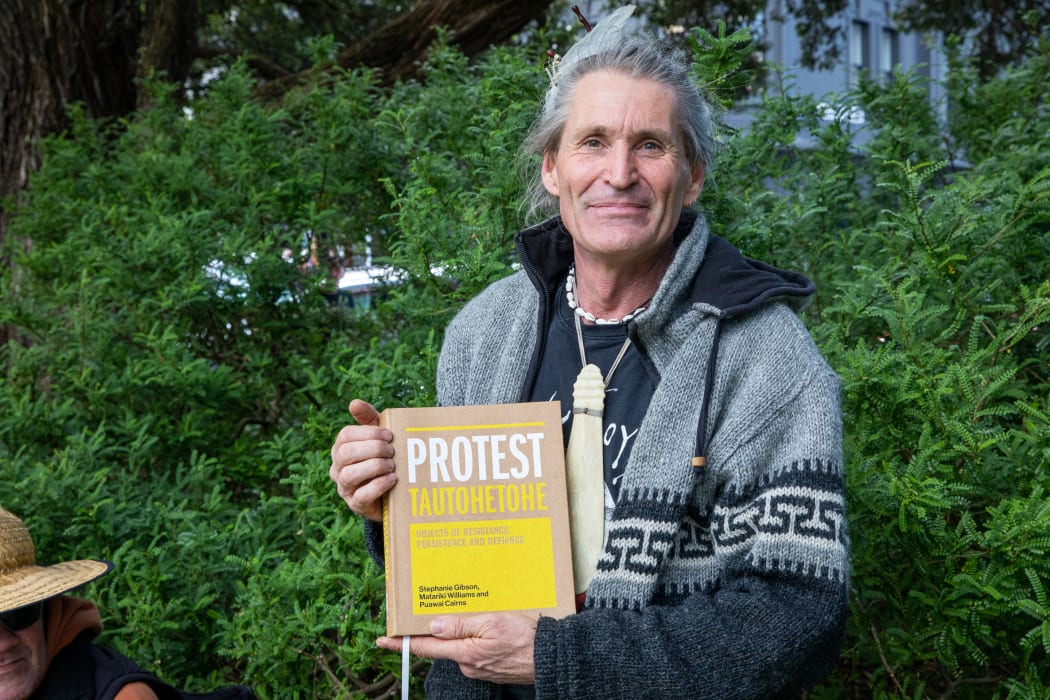 One protestor came well prepared with reading material, specifically 'Protest: Tautohetohe' a history of New Zealand protest movements.