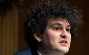 (FILES) In this file photo taken on February 09, 2022, Samuel Bankman-Fried, founder and CEO of FTX, testifies during a Senate Committee on Agriculture, Nutrition and Forestry hearing about "Examining Digital Assets: Risks, Regulation, and Innovation," on Capitol Hill in Washington, DC. - Crisis-struck cryptocurrency platform FTX has gone bankrupt in the USs and its CEO Sam Bankman-Fried has resigned, it said on November 11, 2022, the latest blow in a saga that has reverberated across the digital currency landscape. FTX Group announced in a statement Friday that it filed for Chapter 11 bankruptcy proceedings, adding it has begun an "orderly process to review and monetize assets for the benefit of all global stakeholders." (Photo by SAUL LOEB / AFP)