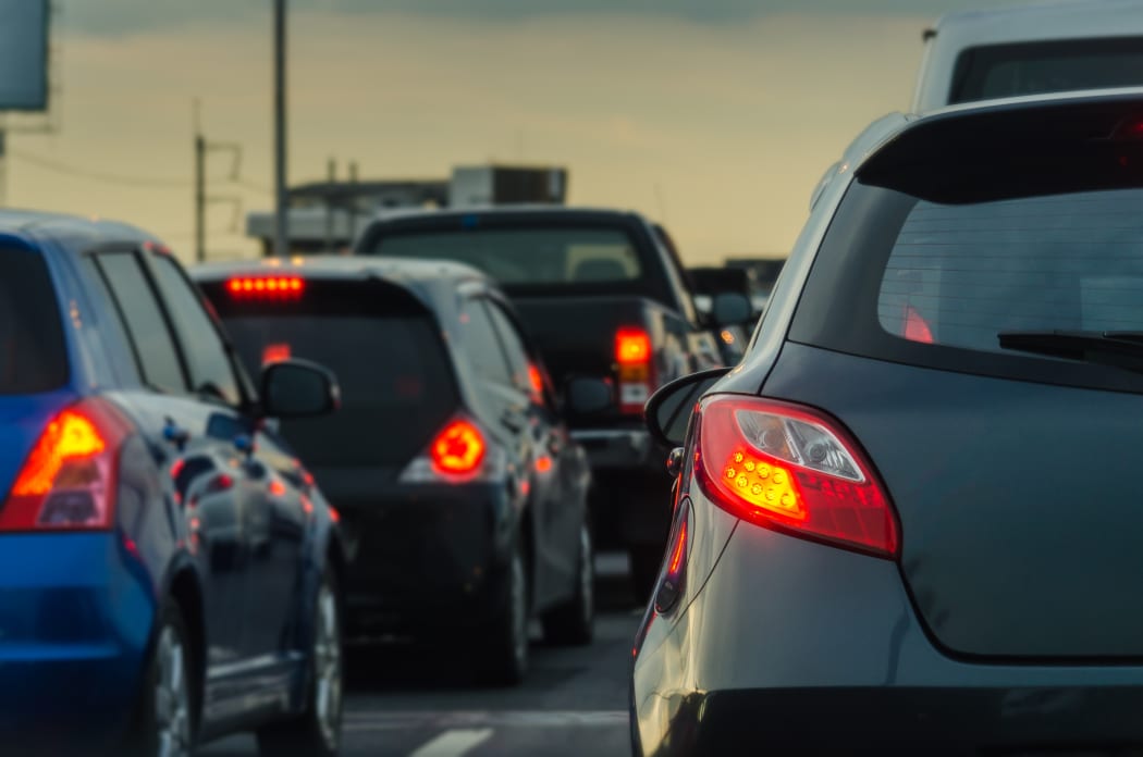 Taffic jam on highway during peak or rush hour.