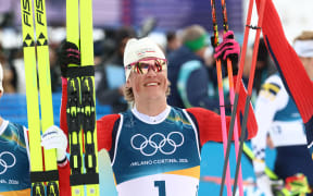 Johannes Hoesflot KLAEBO of Norway celebrates after winnin the cross-country skiing men's 50km mass start classic at the Olympic Winter Games Milano Cortina 2026 at the Tesero Cross-Country Skiing Stadium in Tesero, Italy, on February 21, 2026. Norwegian KLAEBO won the event to claim the gold medal. ( The Yomiuri Shimbun ) (Photo by Kentaro Tominaga / The Yomiuri Shimbun via AFP)