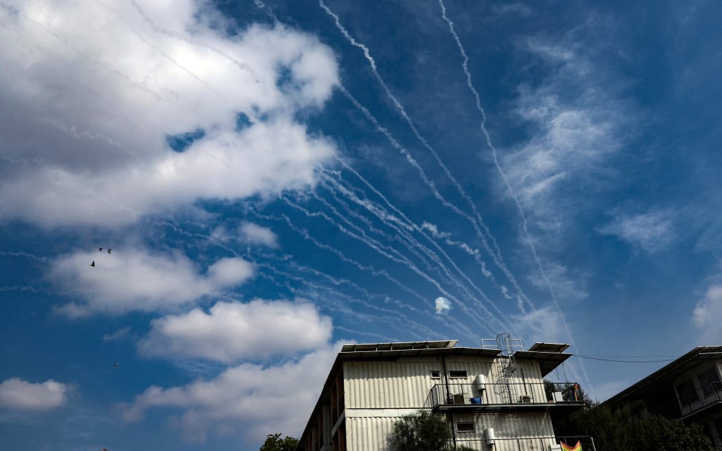 Rockets fired by Palestinian militants in the Gaza Strip iare intercepted by Israel's Iron Dome defence missile system over Sderot on October 8, 2023. At least 40 people have been killed in Israel during fighting with Palestinian militants on October 7, the Magen David Adom emergency medical services said in a statement. (Photo by JACK GUEZ / AFP)