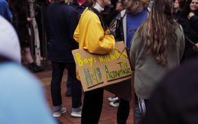 People gathered on Courtenay Place in Wellington to rally against sexual violence.