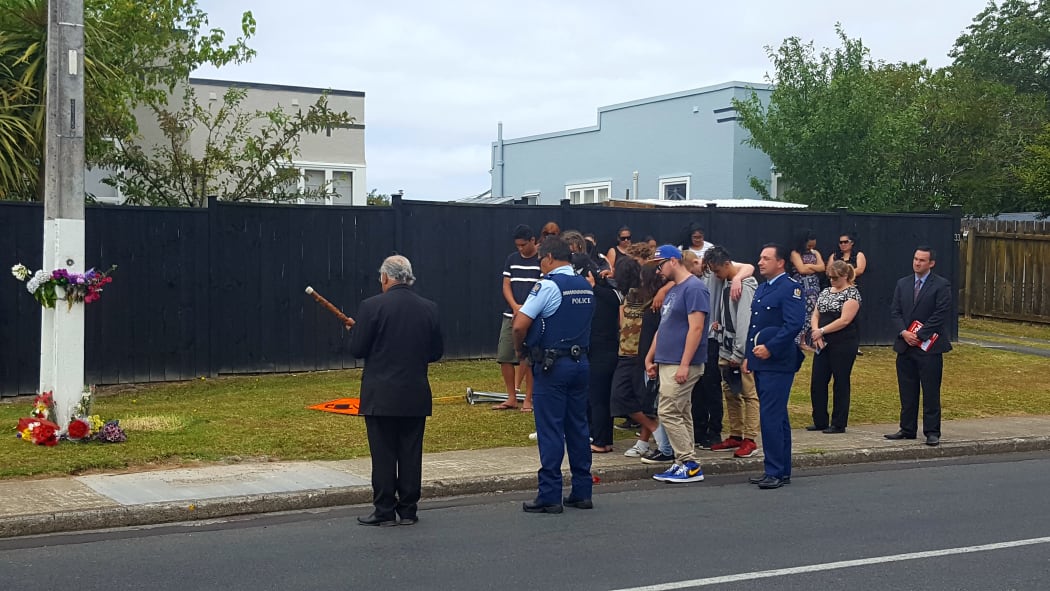 A blessing is held for Jacob Pakura at the scene where he was found fatally injured, on Rua Road in New Lynn.