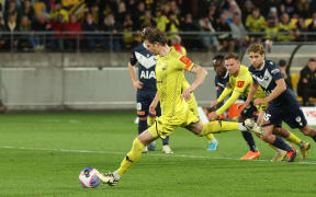 Phoenix captain Alex Rufer shoots a penalty during the A-League Men’s Semi Final against Melbourne  Victory, 2024.