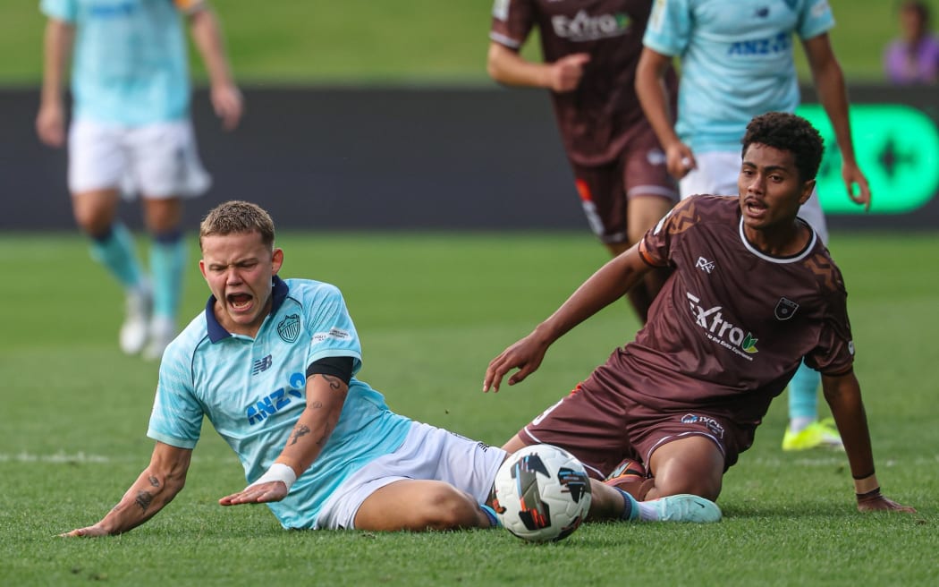 Auckland FC's Daniel Normann (left) and Bula FC's Setareki Hughes clash during the OFC Pro League 2026 match between Auckland FC v Bula FC, North Harbour Stadium Auckland, Friday 23 January 2026. Photo: Shane Wenzlick / www.phototek.nz