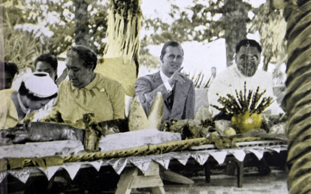 Queen Elizabeth II of England, visits Queen Salote of Tango during a royal tour of 1953. She is seated at a banquet with the Queen of Tonga and the Duke of Edinburgh (Photo by Ann Ronan Picture Library / Ann Ronan Picture Library / Photo12 via AFP)