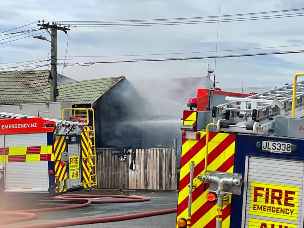 Firefighters tackling the house fire in Kilbirnie, Wellington