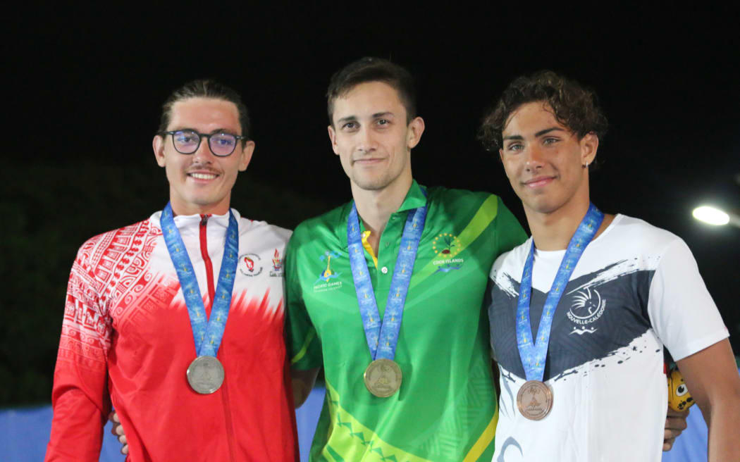 400m freestyle finalists from left Tahiti's Baptiste Savignac (silver) Cook Islands Robert Wesley (gold) New Caledonia's Dabin John Williams.