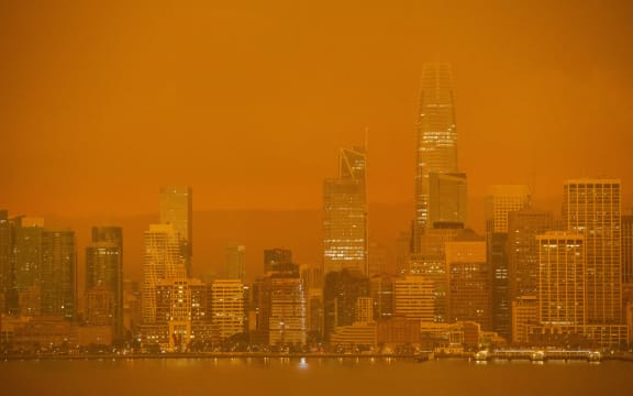 The San Francisco skyline is obscured in orange smoke and haze as their seen from Treasure Island in San Francisco, California on 9 September, 2020.