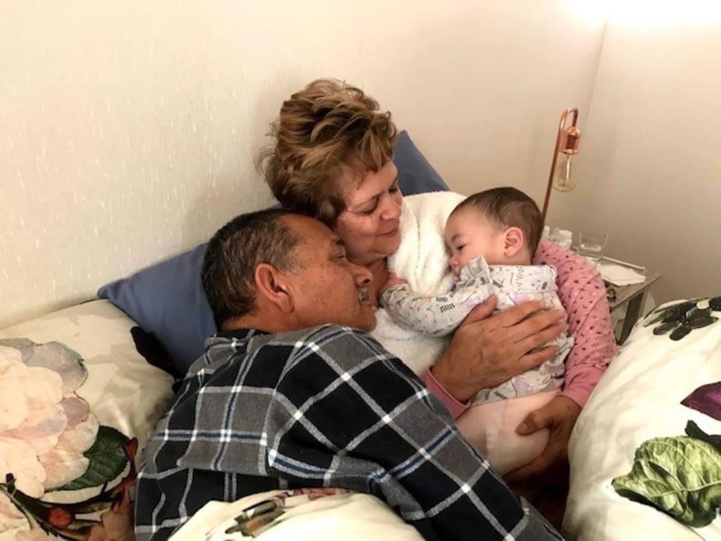 Celeste Cupido's parents Merencia and Raymond Cornelissen with her daughter.