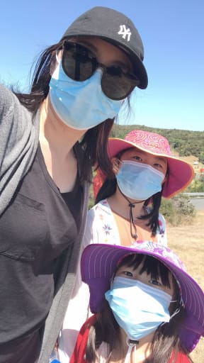 Candy Wang with daughters Tanya, 8,  and Amy, 6, at the Whangaparāoa navy base.