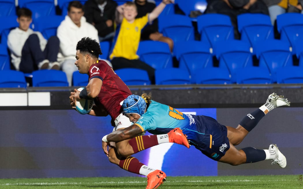 Moana Pasifika mid fielder Danny Toala tackles Highlanders centre Fetuli Paea - Super Rugby Paciﬁc - Moana Pasiﬁka v Highlanders at Mt Smart Stadium, Auckland.