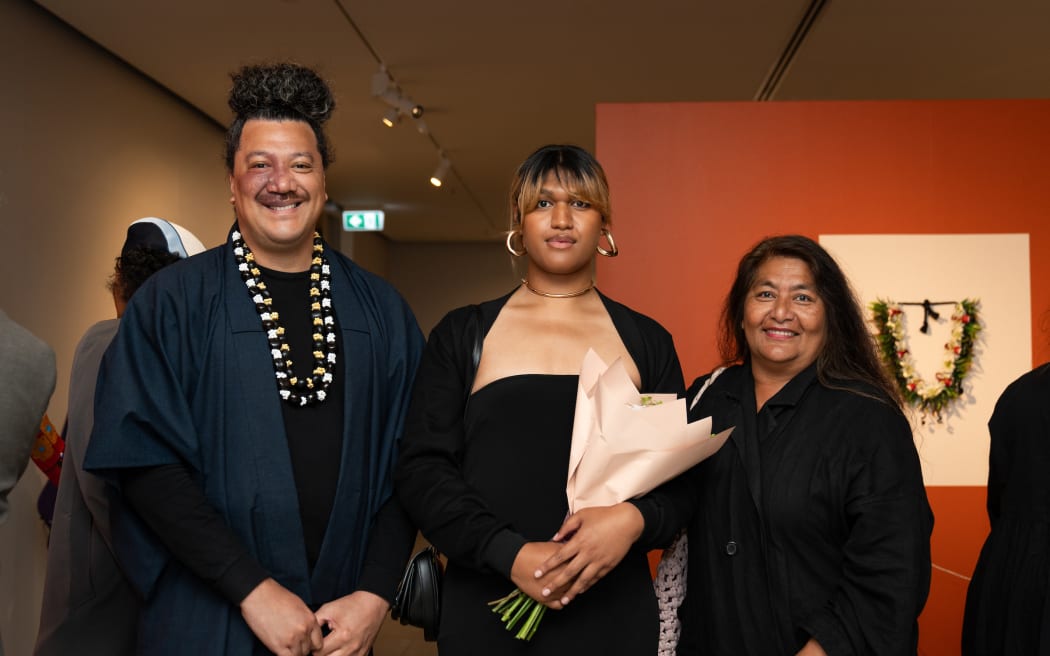 Manuaha’apai Vaeatangitau (centre) with Ali Foa'a and Makerita Urale at the exhibition opening at Pātaka Art + Museum,