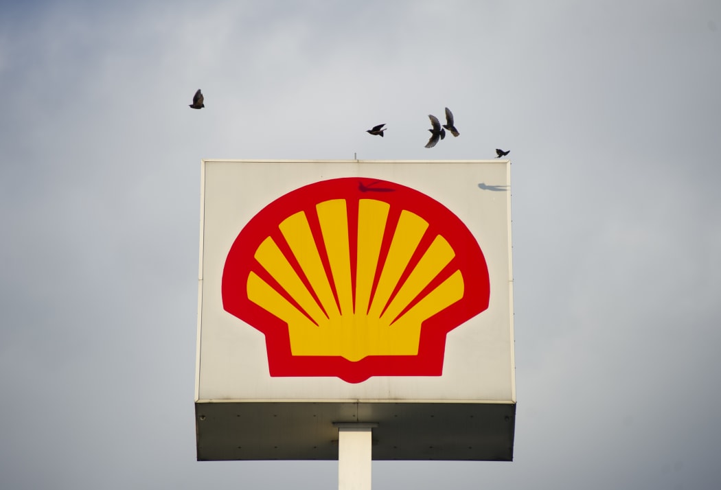 Birds fly over a British-Dutch oil and gas company Royal Dutch Shell PLC sign on October 7, 2020 in Warsaw, Poland.