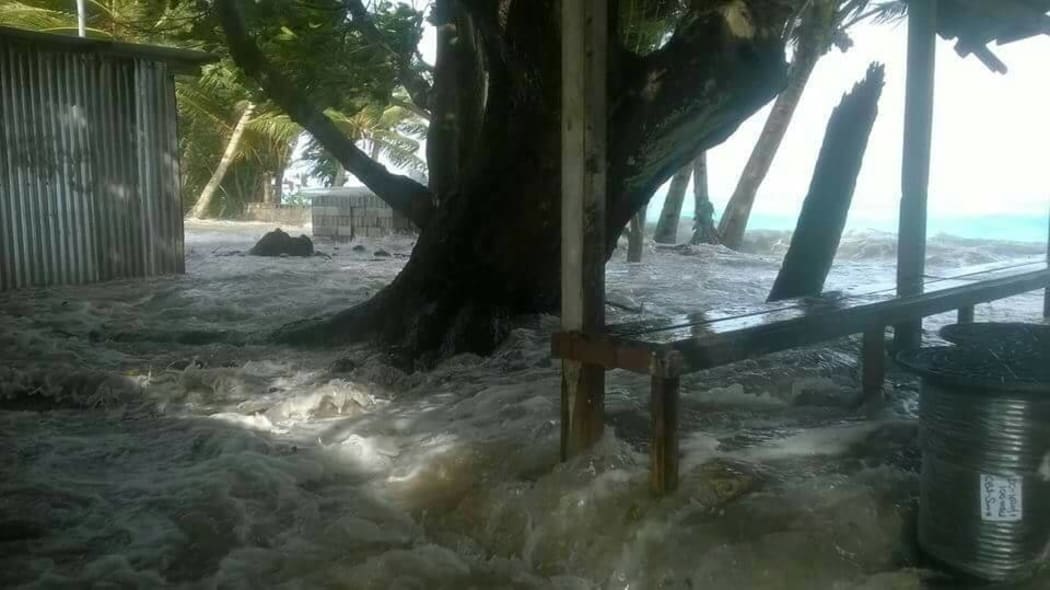 Tuvalu - waves going through a local home