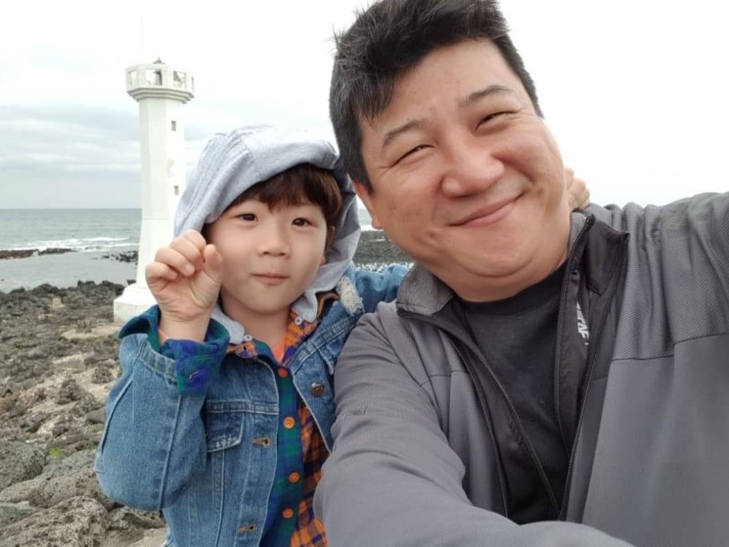 Taewoon Kang with his son Dowook.