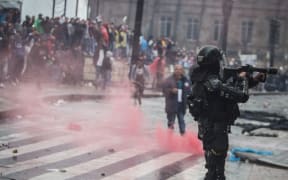 BOGOTA - COLOMBIA, NOVEMBER 21:  Thousands of protesters are seen streamed into the central Bolivar Square in clashes with the Mobile Anti-Disturbances Squadron (ESMAD in Spanish) in Bogota, Colombia on November 21, 2019.