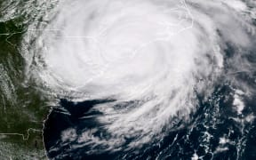 Satellite image taken on 14 September, 2018, shows Hurricane Florence hitting the US east coast.