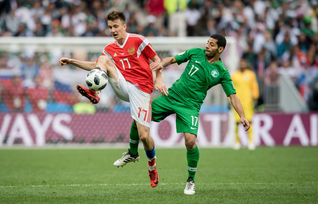 Aleksandr Golovin of Russia fields the ball against Saudi Arabia in the World Cup opener.