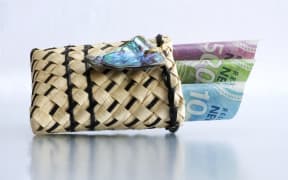 Kete with money in it.