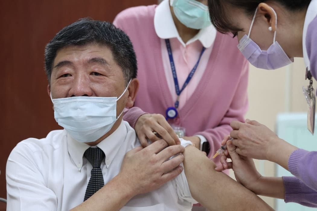 Taiwan's Health Minister Chen Shih-chung receiving a Covid-19 vaccine at the National Taiwan University Hospital in Taipei.