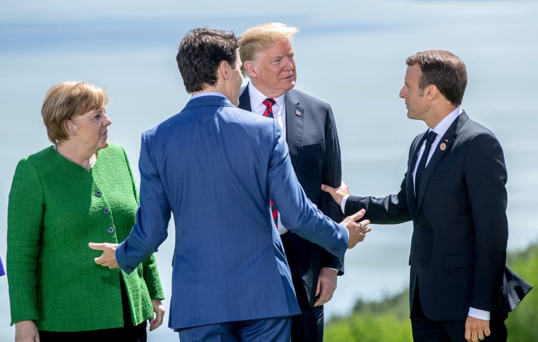 German Chancellor Angela Merkel, Canadian Prime Minister Justin Trudeau,  
US President Donald Trump and French President Emmanuel Macron at the G7 summit in Canada.
