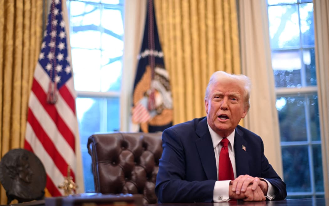 US President Donald Trump speaks to journalists in the Oval Office of the White House in Washington, DC, on January 30, 2025.