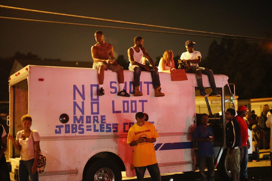 Despite the Brown family's continued call for peaceful demonstrations, violent protests have erupted nearly every night in Ferguson since the killing.