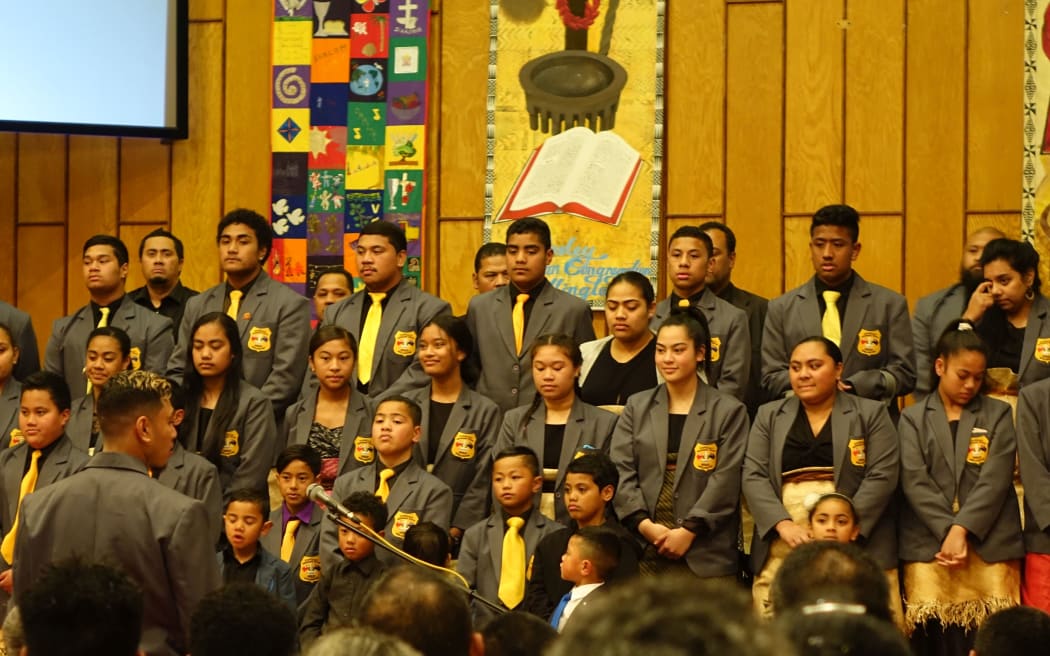 Choir prepares to sing at the Po Lotu.
