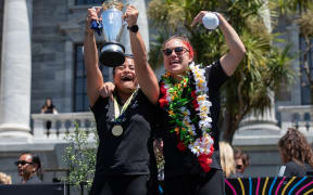 Fans celebrate the Black Ferns at an event at Parliament