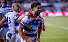 Shaun Johnson celebrates after the Warriors score the winning try.